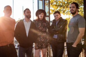 White Ford Bronco: DC's All '90s Band